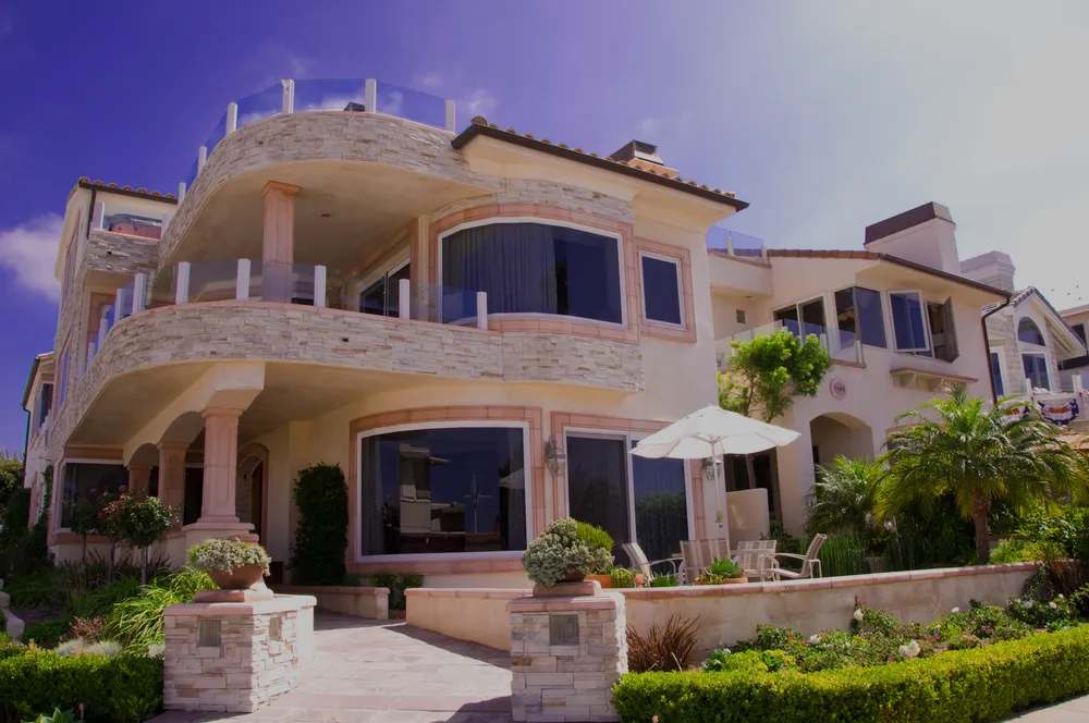 Naples-style home with tinted windows